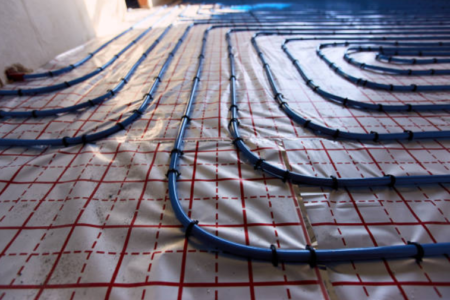 On-Site Installation Service for Residential Hydronic Underfloor Heating – Professional Installation with Blue Heating Pipes