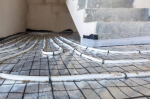 Stairwell + Whole-House Hydronic Underfloor Heating Installation – Custom Piping Layout